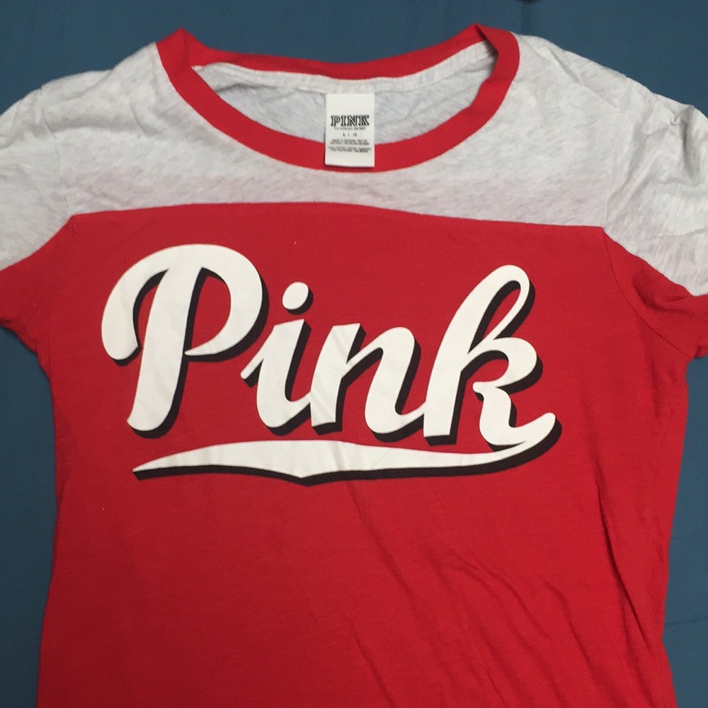 Red and white Pink Victoria’s Secret t-shirt.